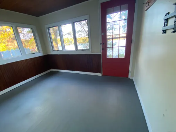 an empty room with windows