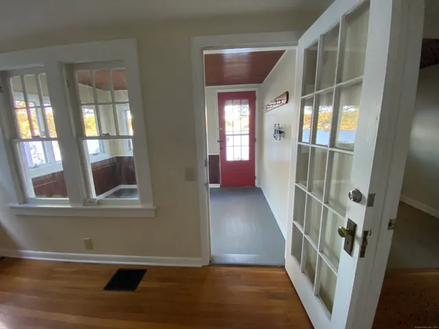 a view of an empty room with a window