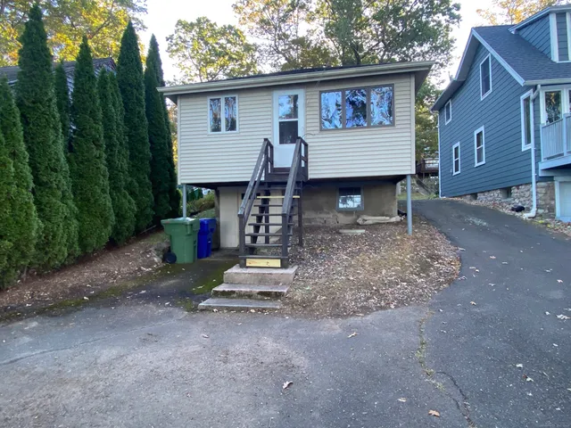 a view of a yard with a tree