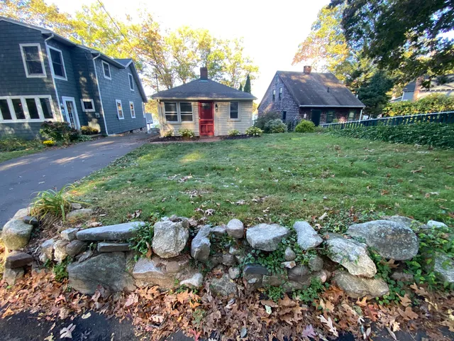 a backyard of a house with lots of green space