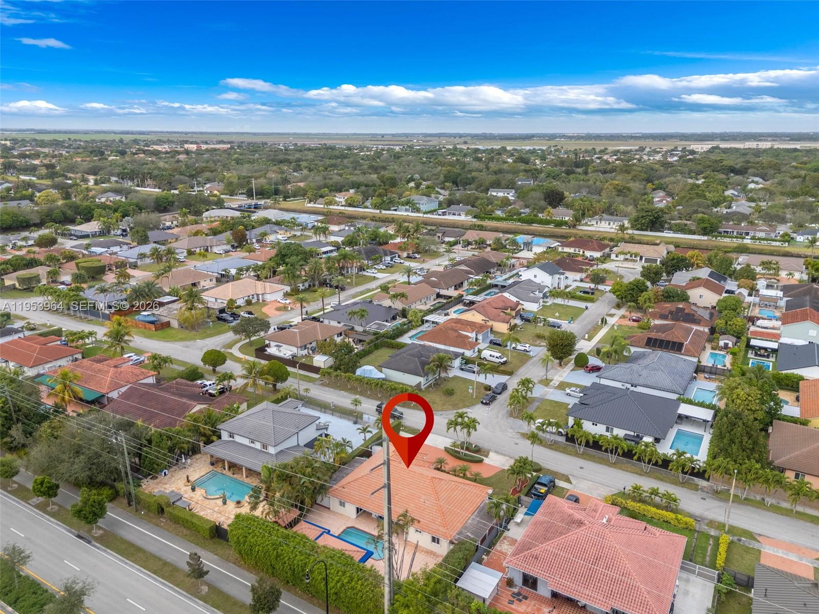 14920 Southwest 151st Terrace Miami, FL 33196 - Photo 19 of 27 an aerial view of residential houses with outdoor space