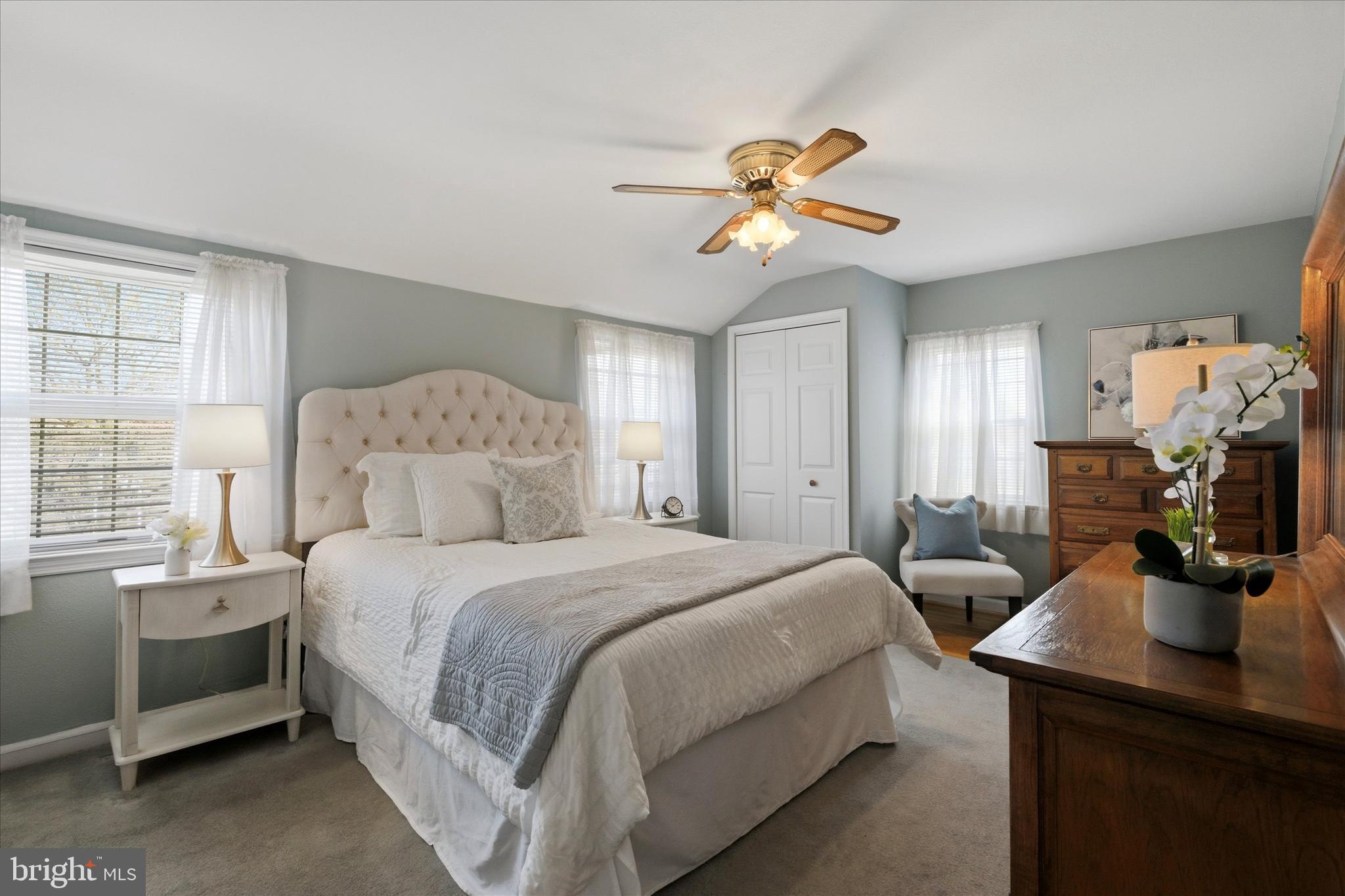 1612 Colony Lane Havertown, PA 19083 - Photo 18 of 34 a bedroom with a bed and a chandelier