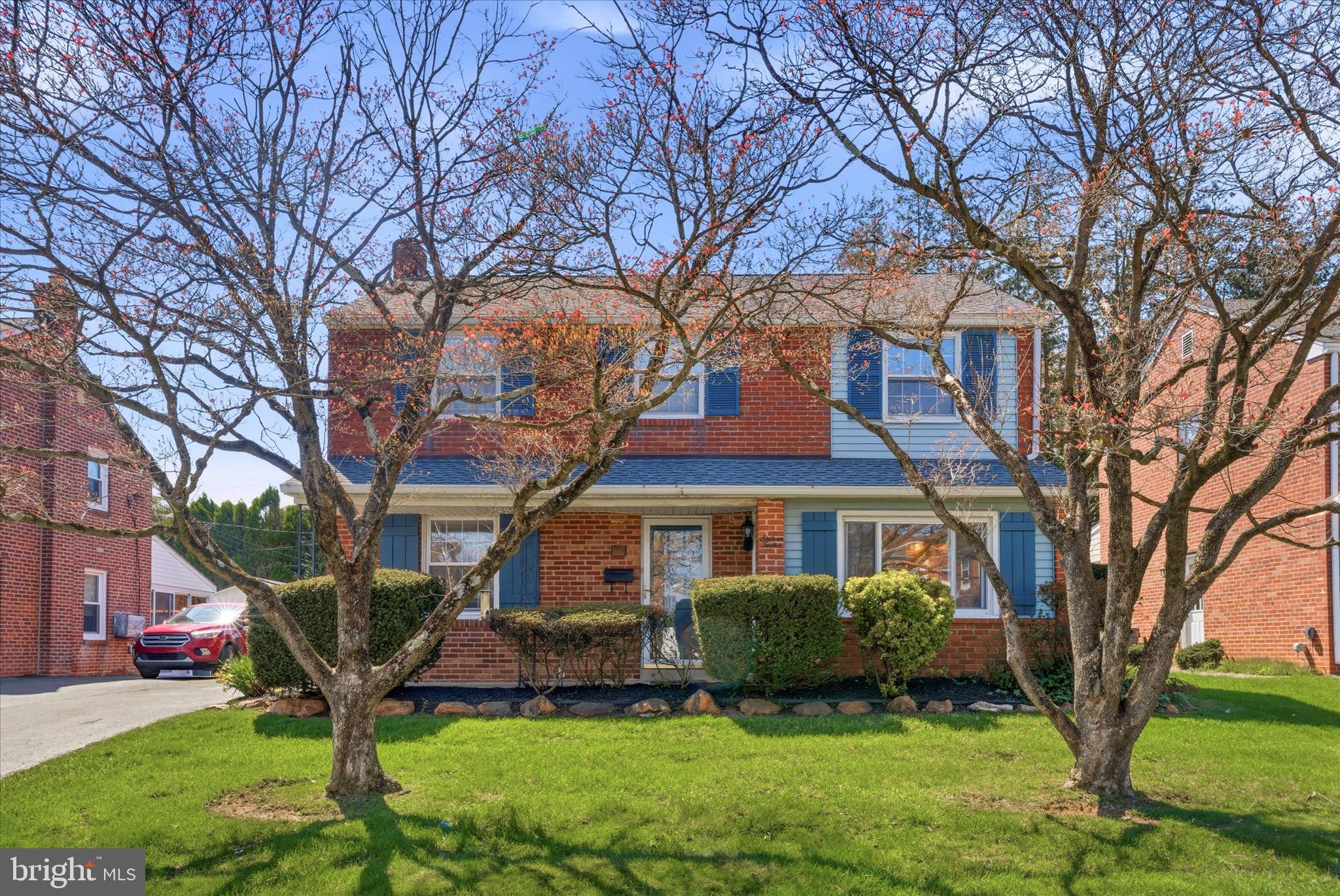 1612 Colony Lane Havertown, PA 19083 - Photo 2 of 34 a front view of a house with a yard