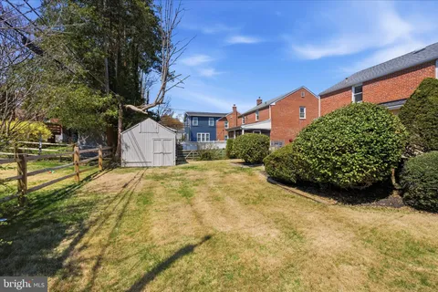 a view of a backyard of the house