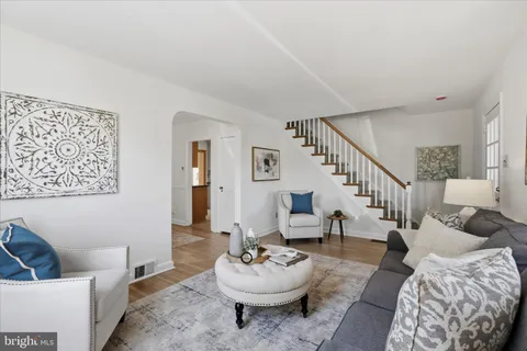 a living room with furniture and a couch