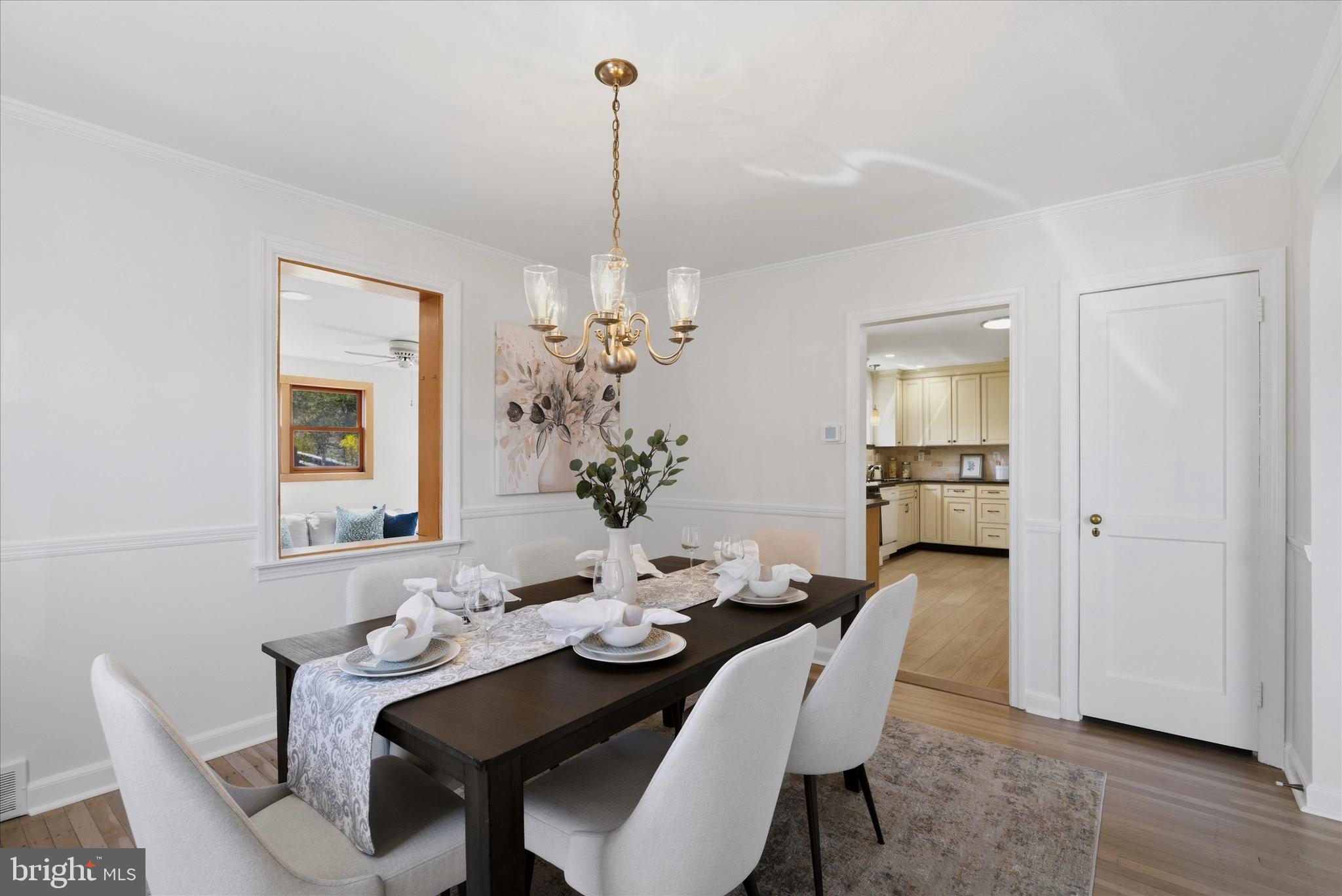1612 Colony Lane Havertown, PA 19083 - Photo 7 of 34 a view of a dining room with furniture window and wooden floor