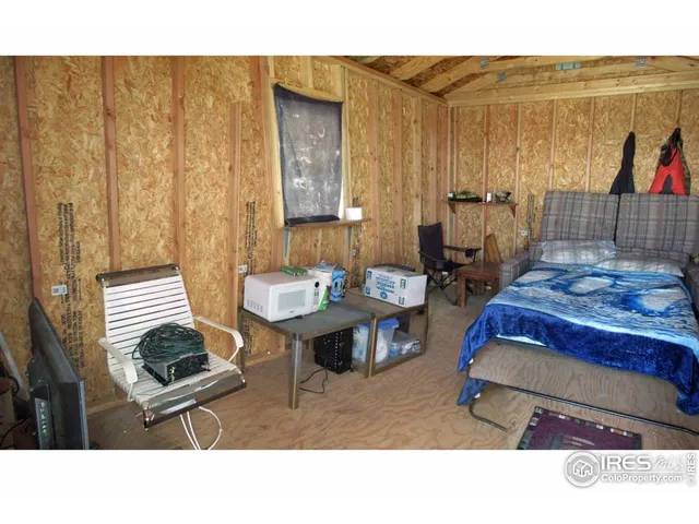a kitchen with a table and chairs