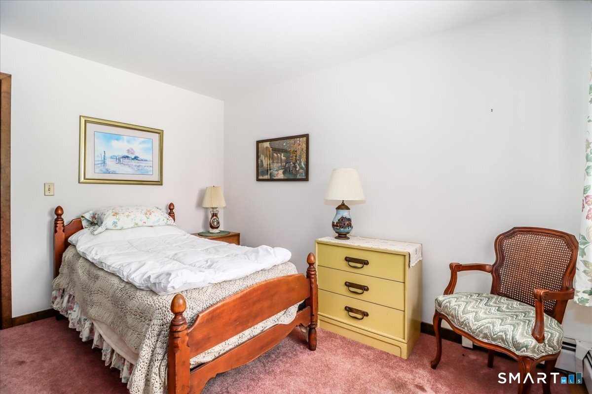 5 Western View Road New Milford, CT 06776 - Photo 25 of 36 a bedroom with a bed and furniture