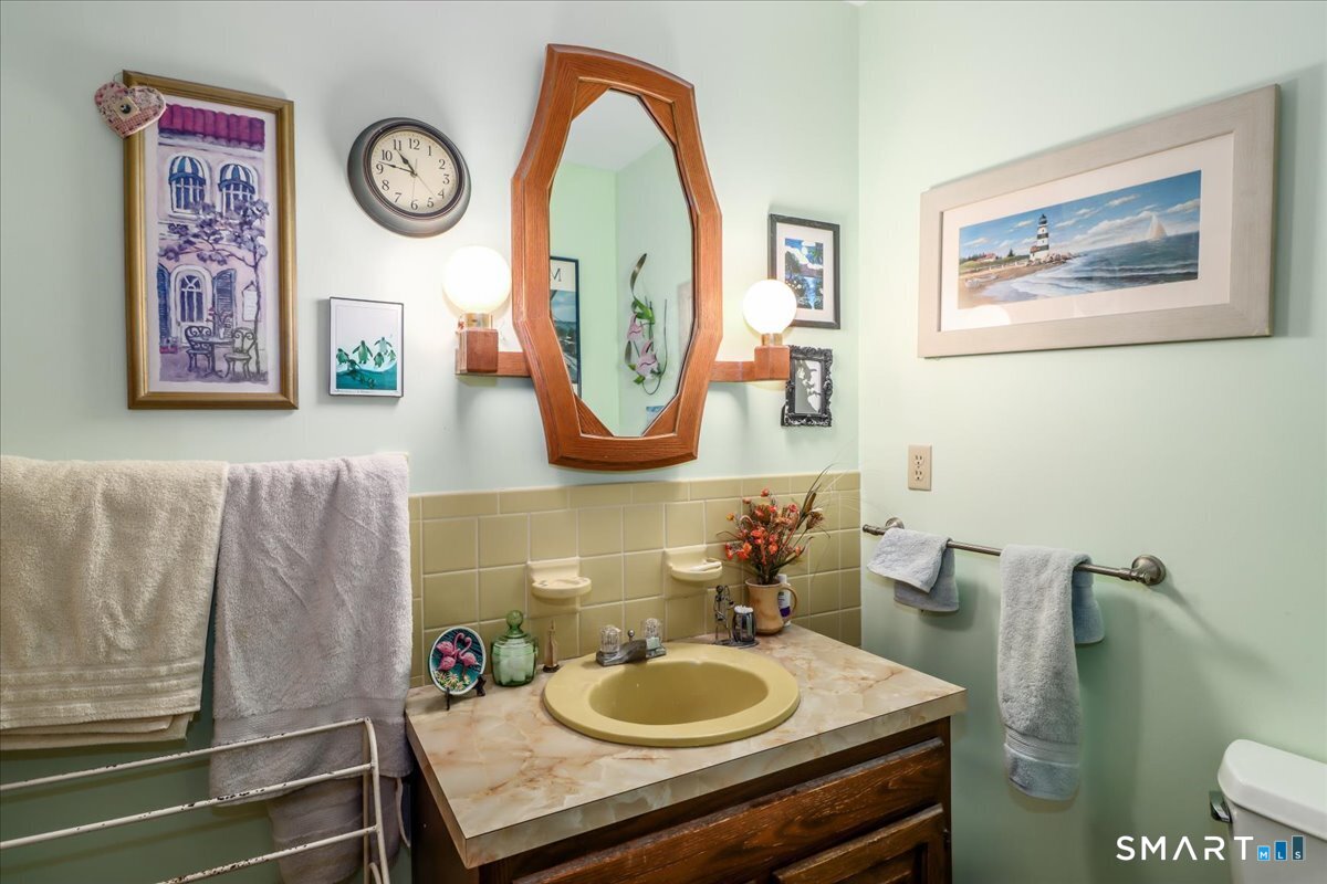 5 Western View Road New Milford, CT 06776 - Photo 26 of 36 a bathroom with a sink mirror and vanity