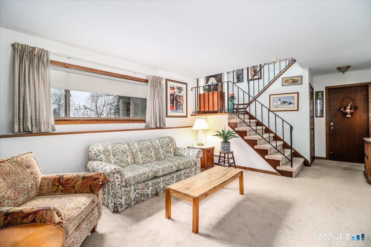 5 Western View Road New Milford, CT 06776 - Photo 30 of 36 a living room with furniture and a potted plant
