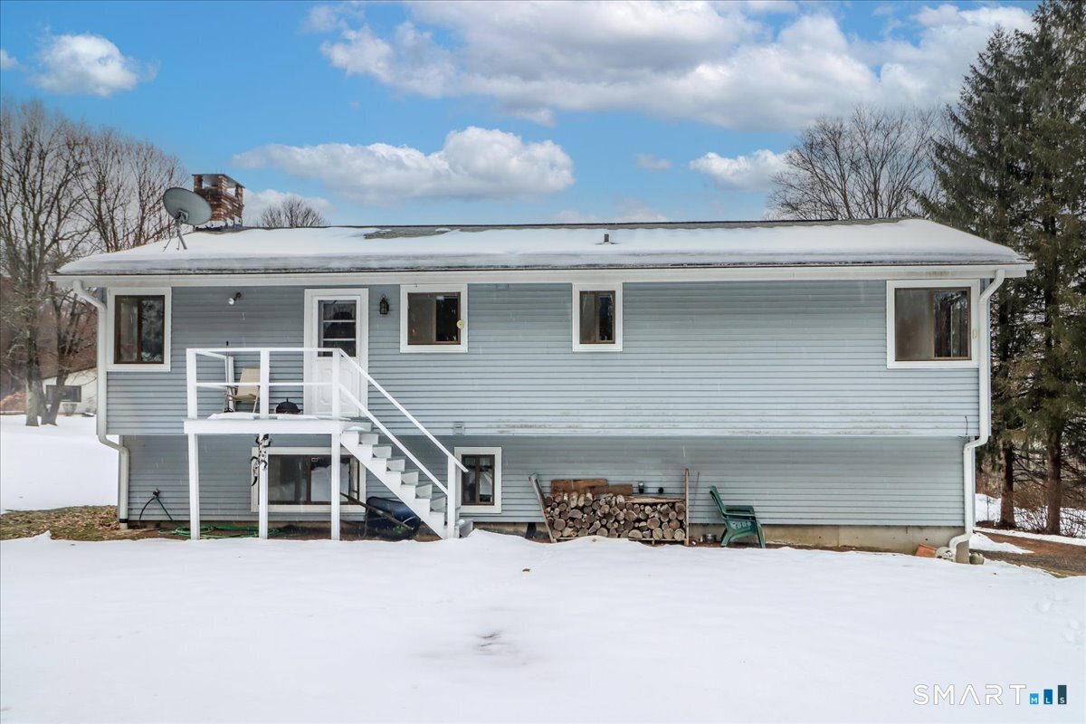 5 Western View Road New Milford, CT 06776 - Photo 3 of 36 a front view of a house with a yard