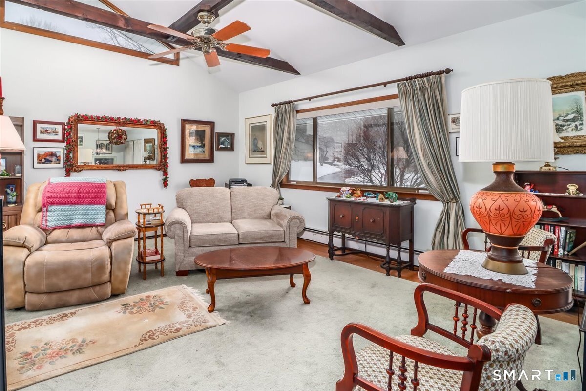 5 Western View Road New Milford, CT 06776 - Photo 6 of 36 a living room with furniture and a large window