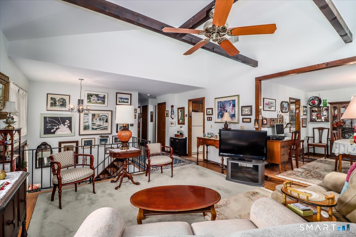 5 Western View Road New Milford, CT 06776 - Photo 7 of 36 a living room with furniture workspace and a flat screen tv