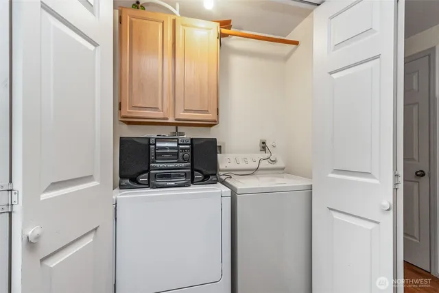 a view of a livingroom with furniture and windows