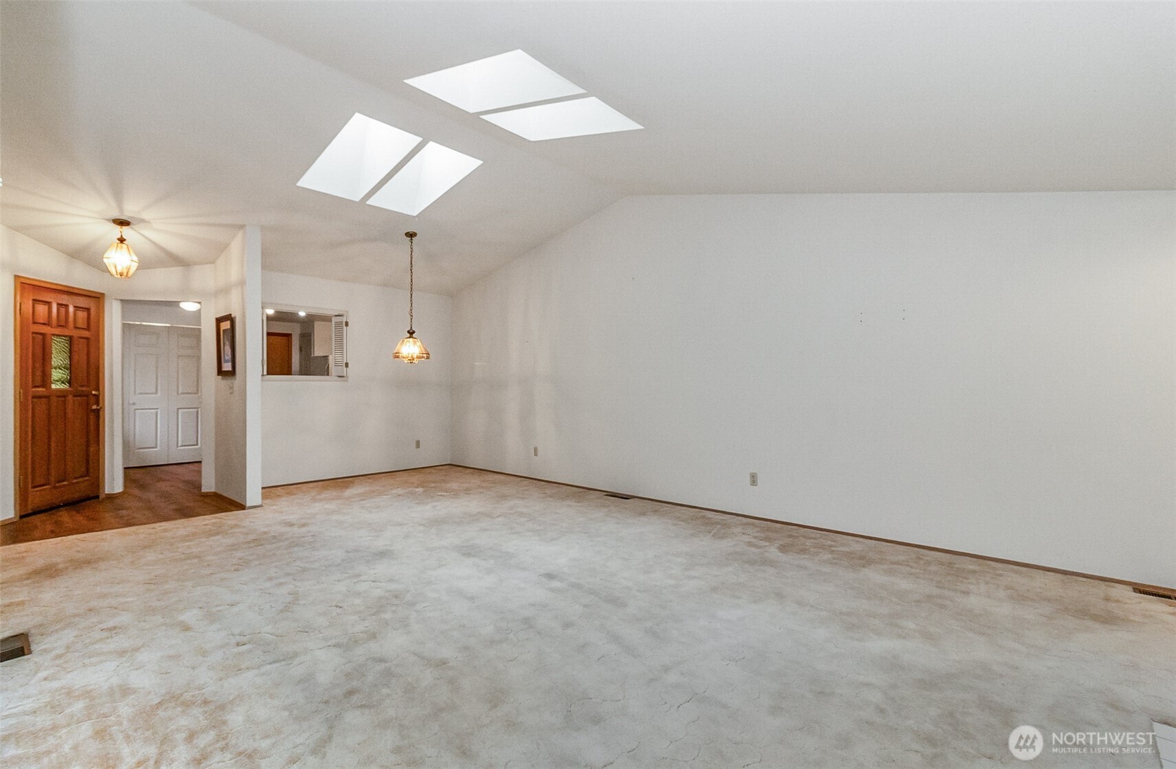 1310 Boise Street Fircrest, WA 98466 - Photo 18 of 36 an empty room with windows