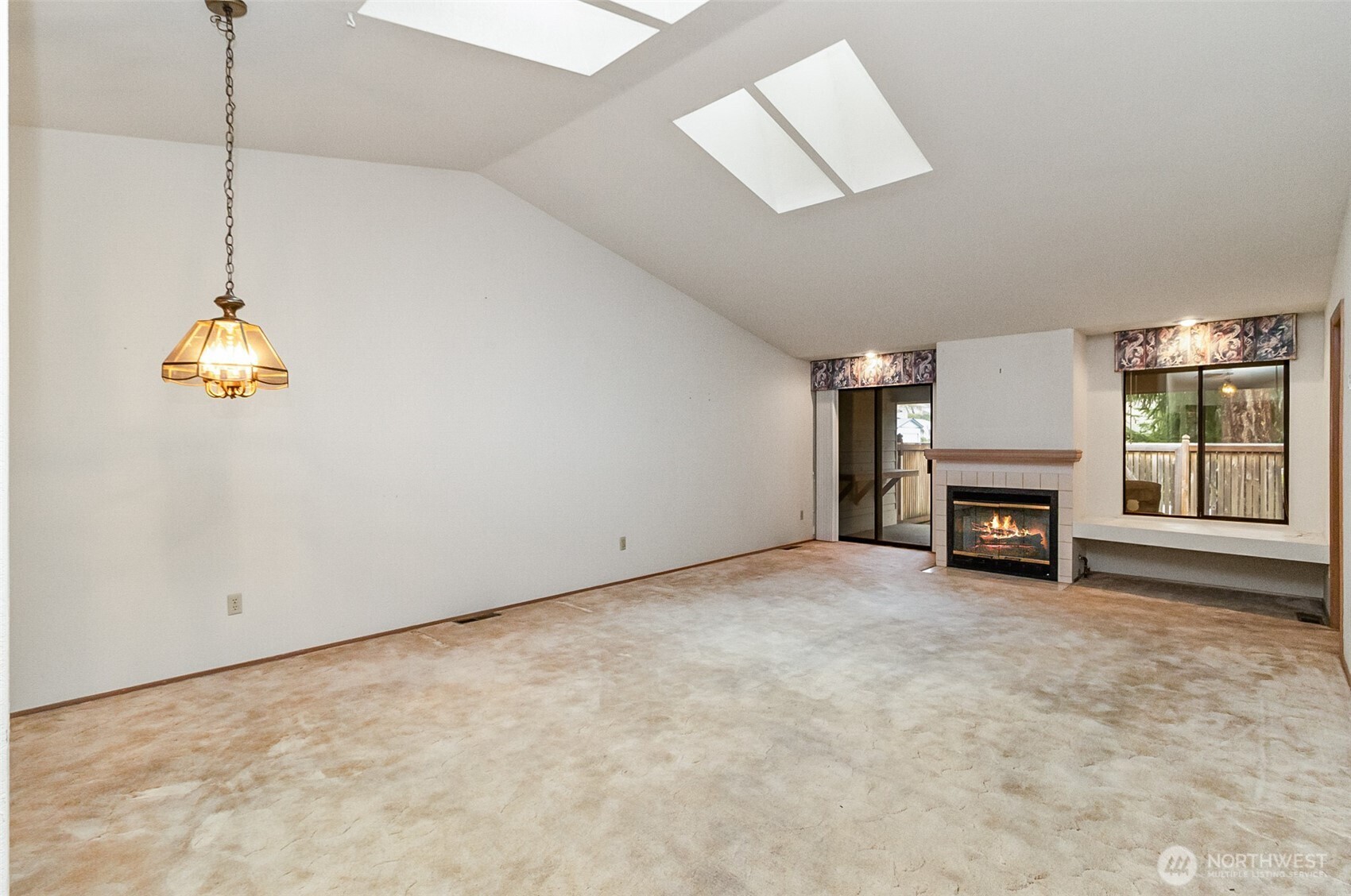 1310 Boise Street Fircrest, WA 98466 - Photo 21 of 36 a view of a livingroom with a fireplace
