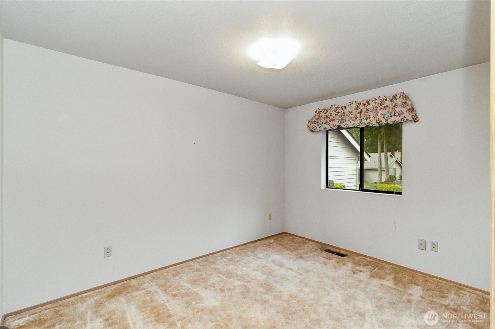1310 Boise Street Fircrest, WA 98466 - Photo 24 of 36 an empty room with windows