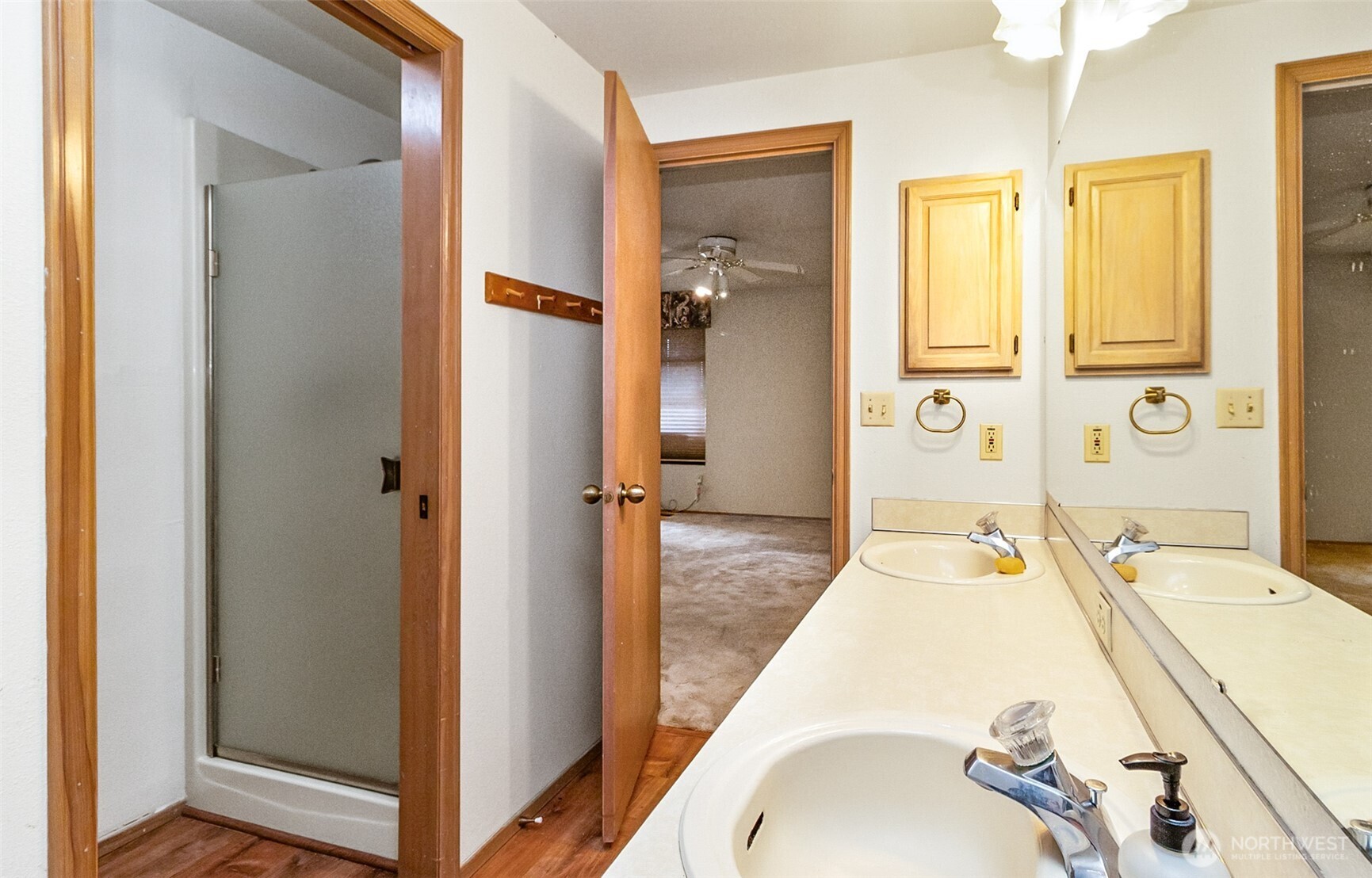 1310 Boise Street Fircrest, WA 98466 - Photo 33 of 36 a en suite bathroom with a tub sink and mirror