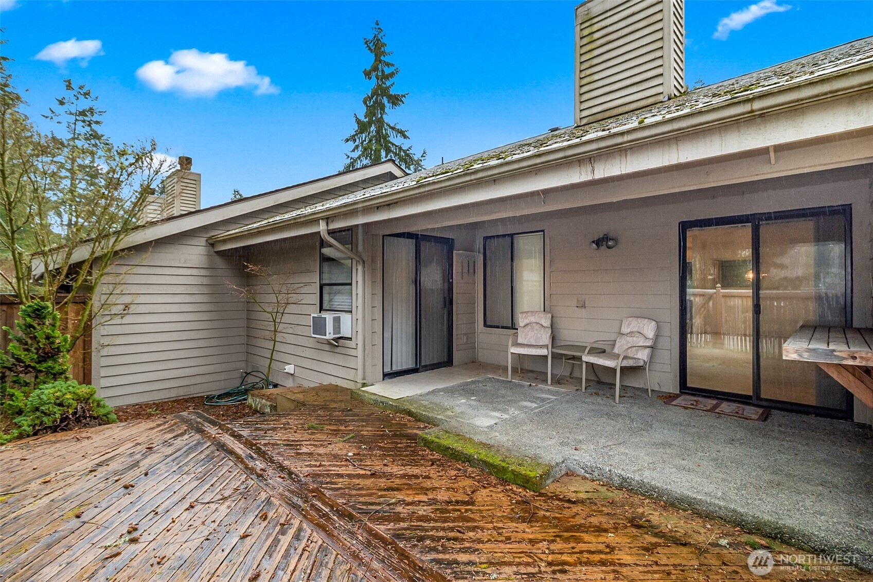 1310 Boise Street Fircrest, WA 98466 - Photo 34 of 36 a front view of a house with a garden