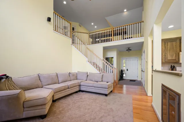 a living room with furniture or stairs and a couch