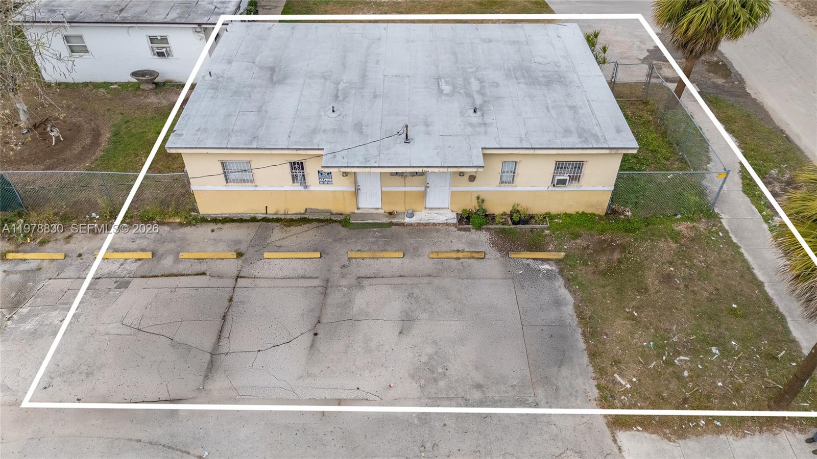 1101 Southwest 2nd Street Homestead, FL 33030 - Photo 1 of 17 a aerial view of a house with a yard