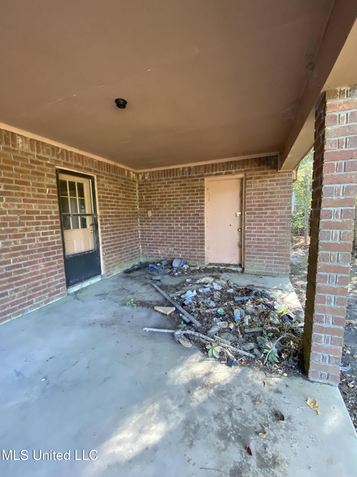 742 Hamburg Road Roxie, MS 39661 - Photo 13 of 14 742 Hamburg carport