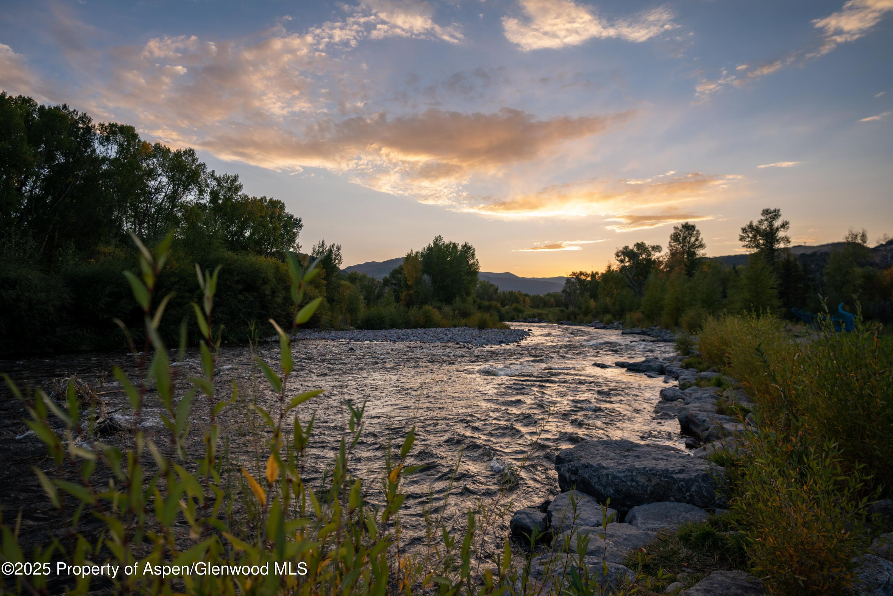 140 Basalt Center Circle, Unit 231 Basalt, CO 81621 - Photo 6 of 17 a view of a lake view with houses