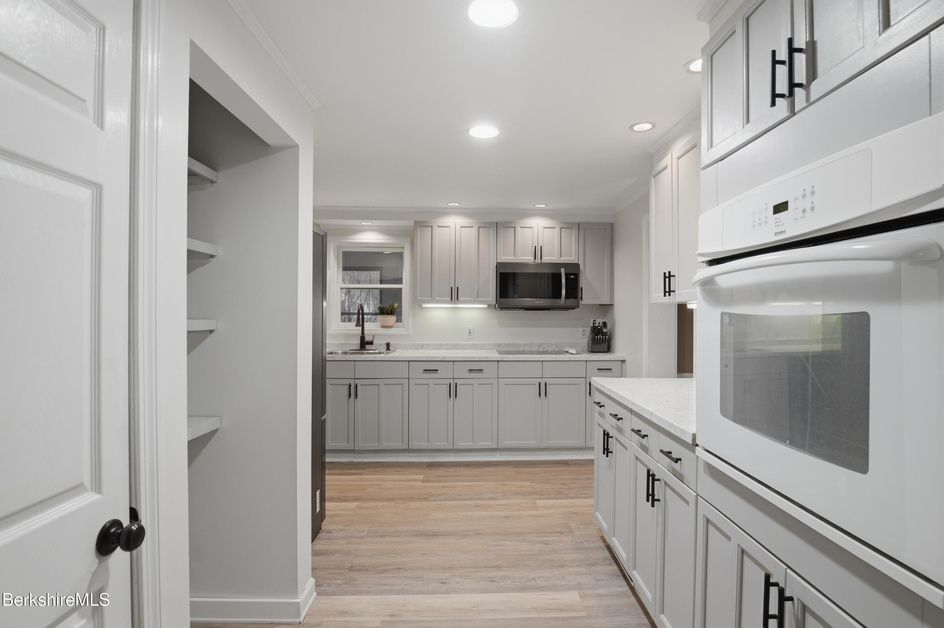 117 Norfolk Road New Marlborough, MA 01259 - Photo 13 of 59 a kitchen with a sink cabinets and stainless steel appliances