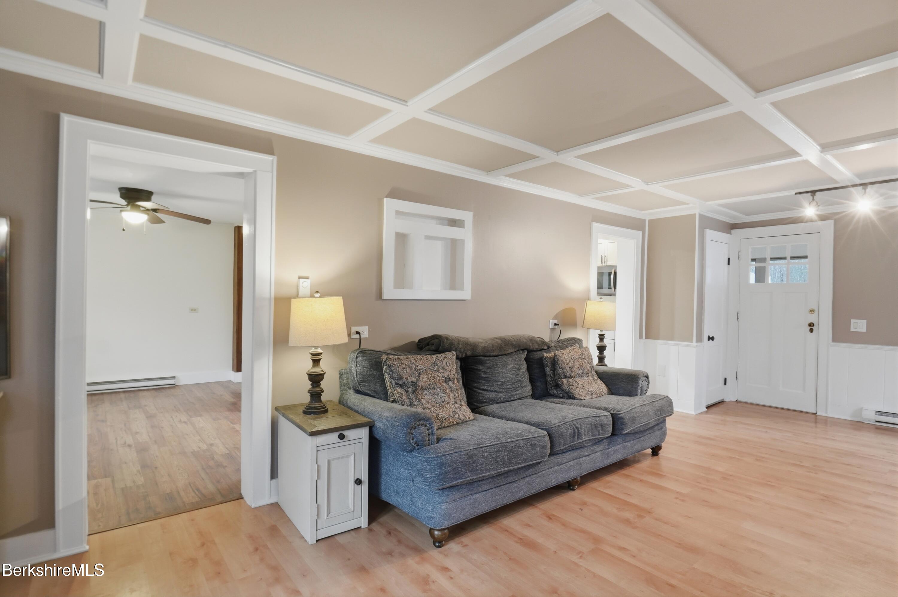 117 Norfolk Road New Marlborough, MA 01259 - Photo 18 of 59 a living room with furniture and a wooden floor