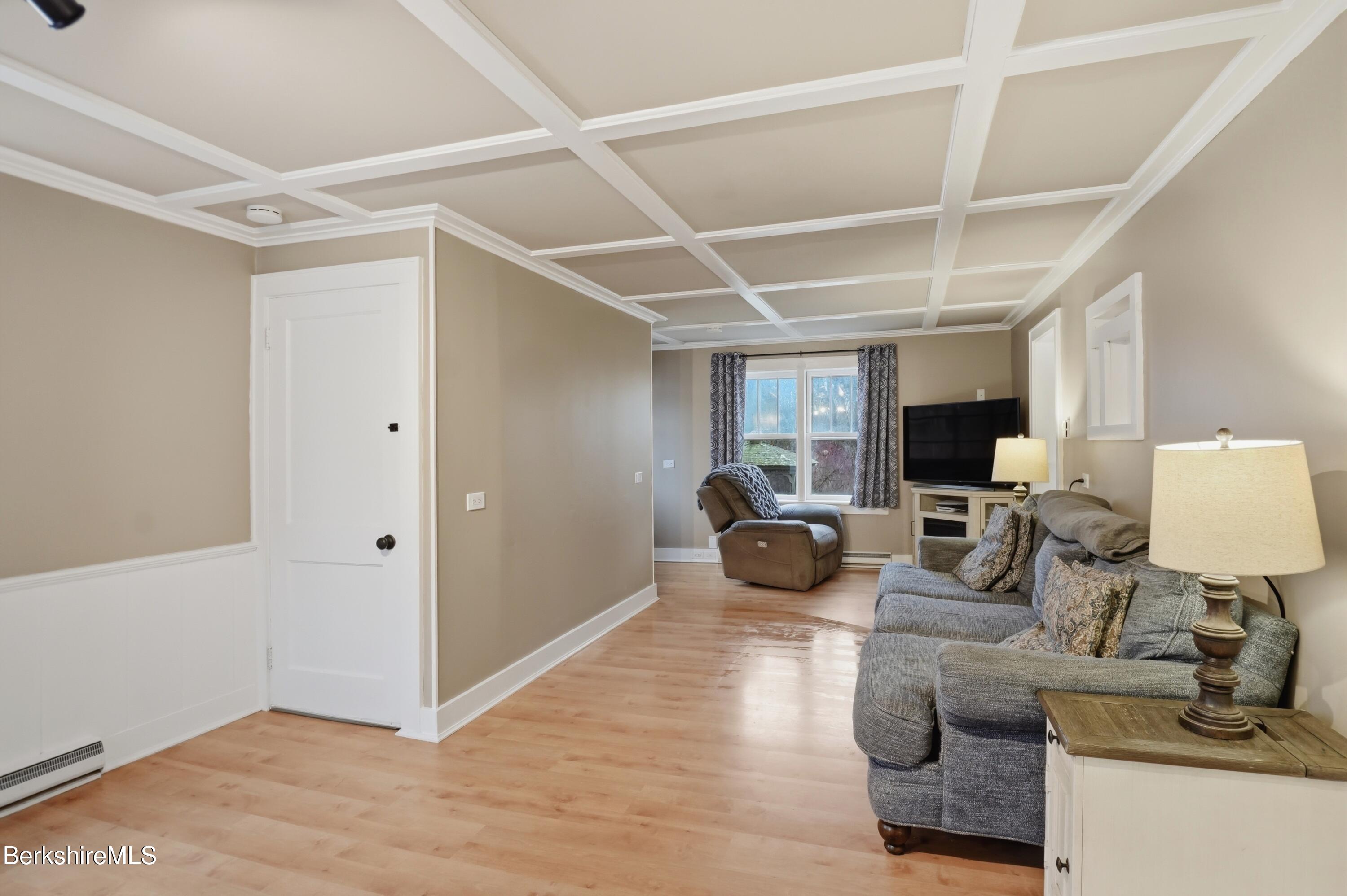 117 Norfolk Road New Marlborough, MA 01259 - Photo 22 of 59 a living room with furniture and a flat screen tv