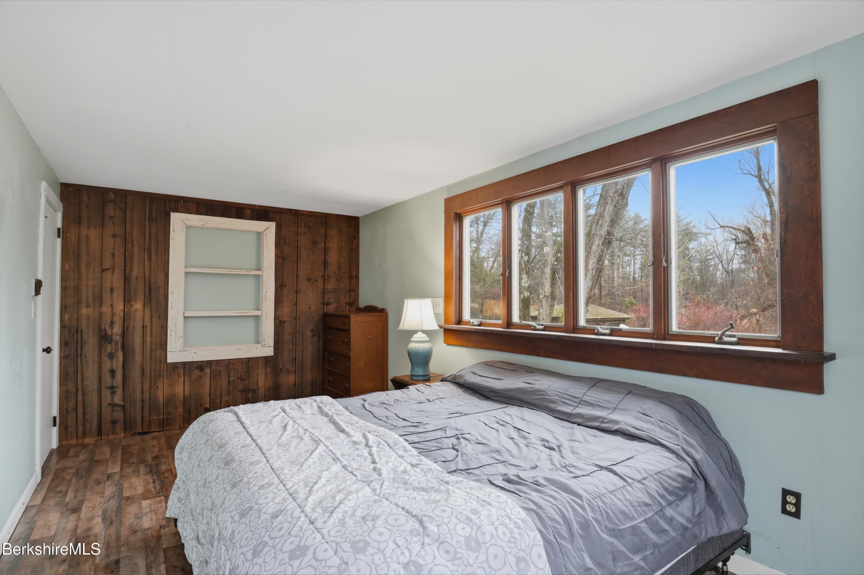 117 Norfolk Road New Marlborough, MA 01259 - Photo 29 of 59 a bedroom with a large bed and a large window
