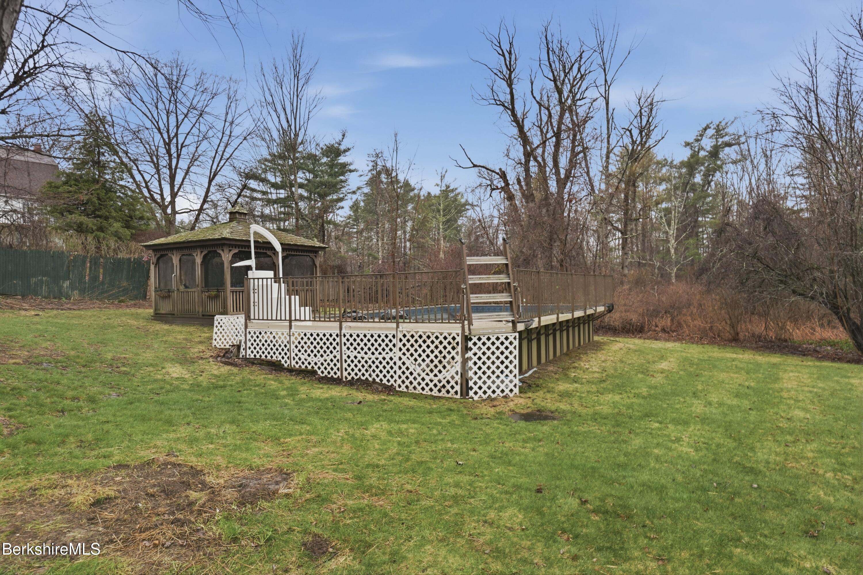 117 Norfolk Road New Marlborough, MA 01259 - Photo 45 of 59 a front view of a house with a garden