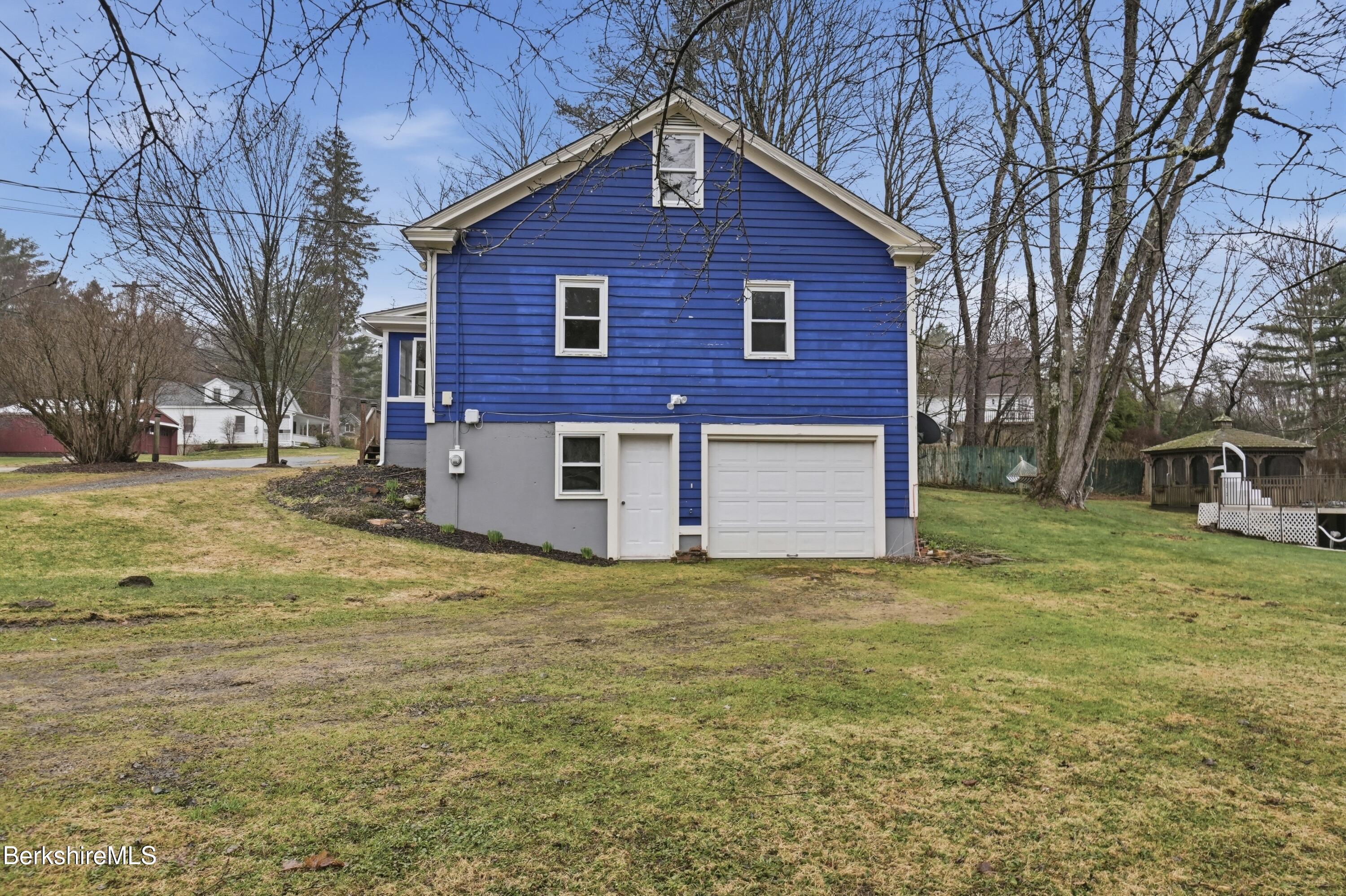117 Norfolk Road New Marlborough, MA 01259 - Photo 47 of 59 a view of a yard in front of a house with large tree