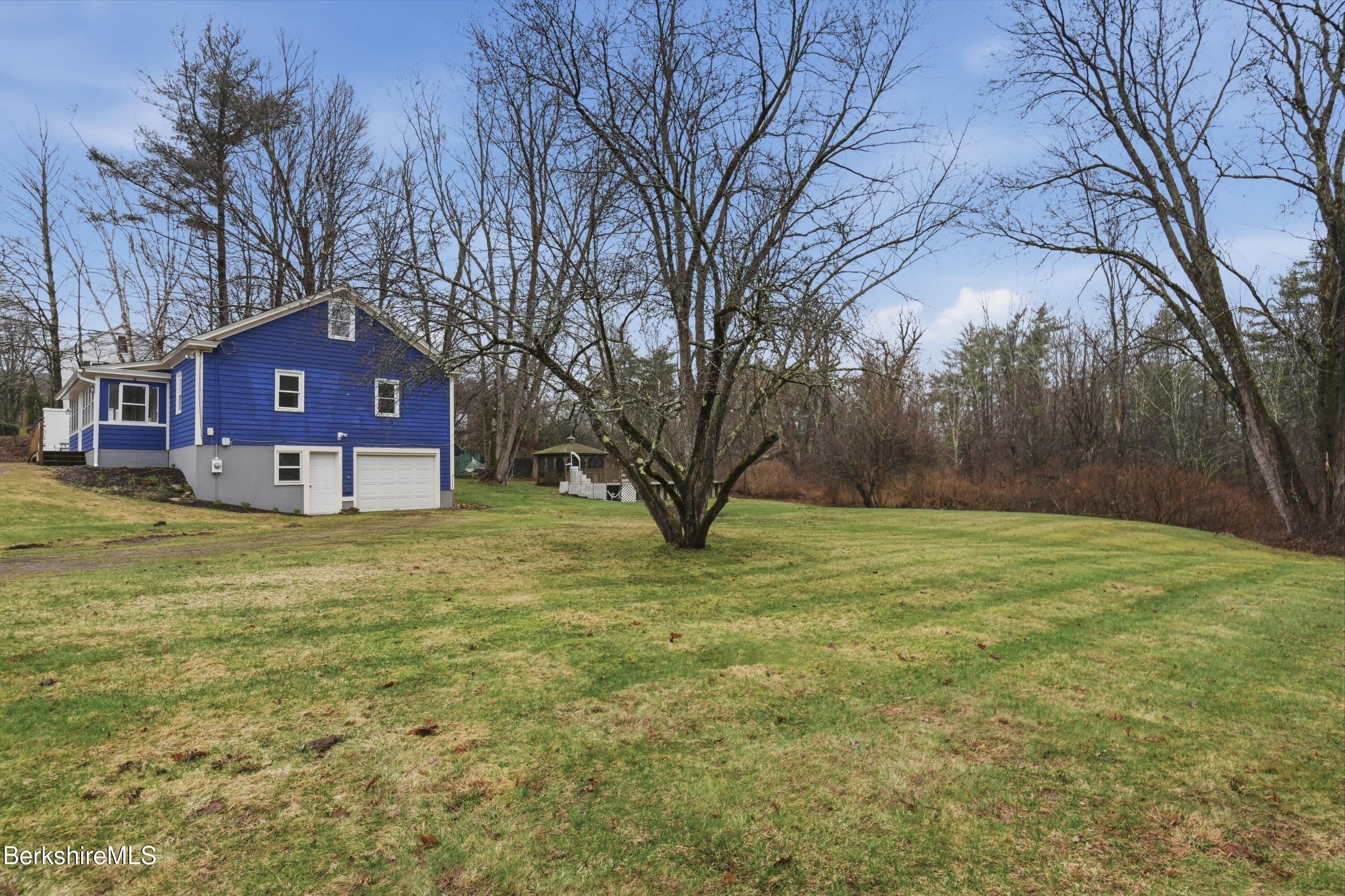 117 Norfolk Road New Marlborough, MA 01259 - Photo 51 of 59 a view of a big yard with large trees