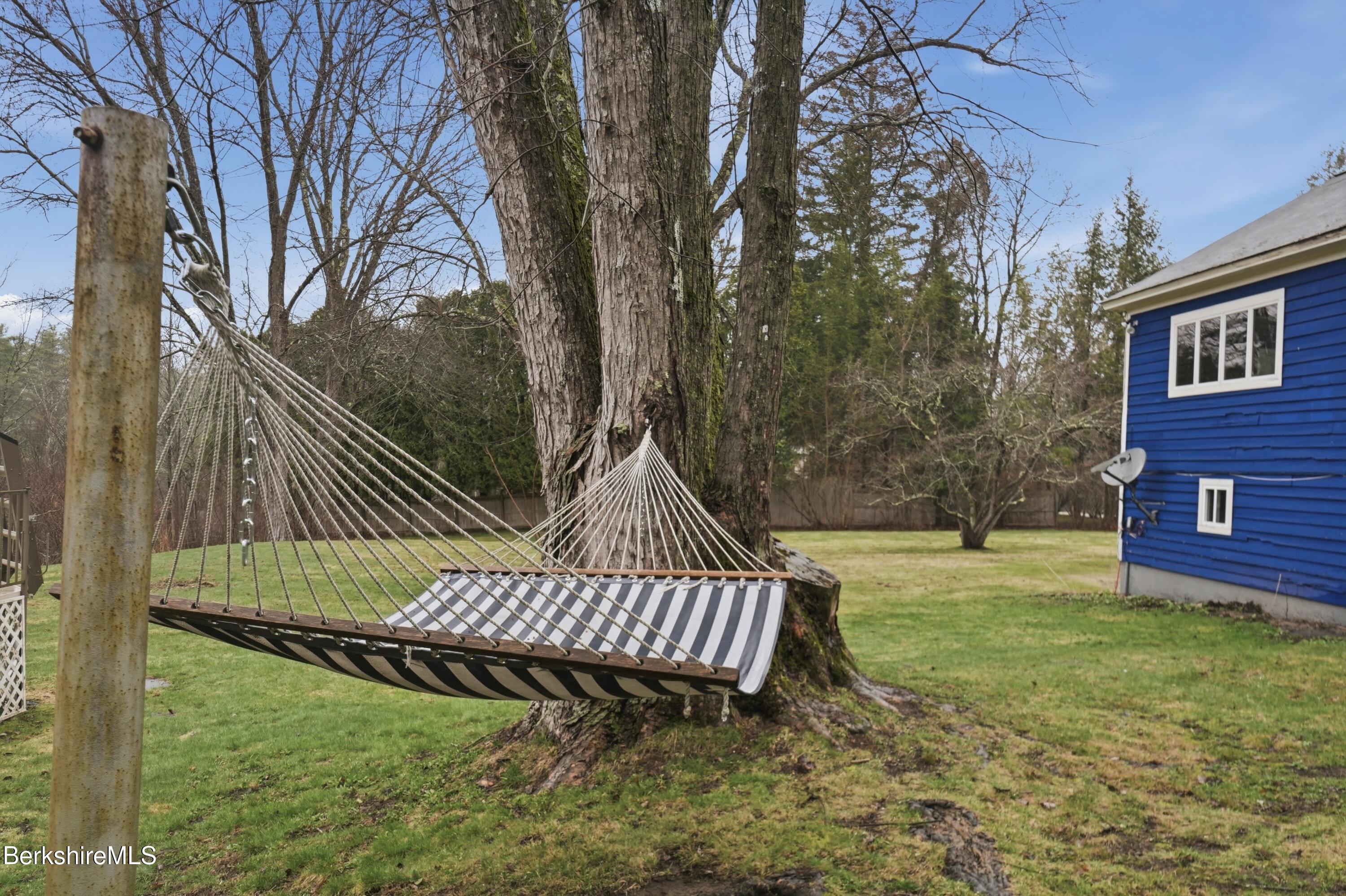 117 Norfolk Road New Marlborough, MA 01259 - Photo 54 of 59 a view of a chair and table in the backyard