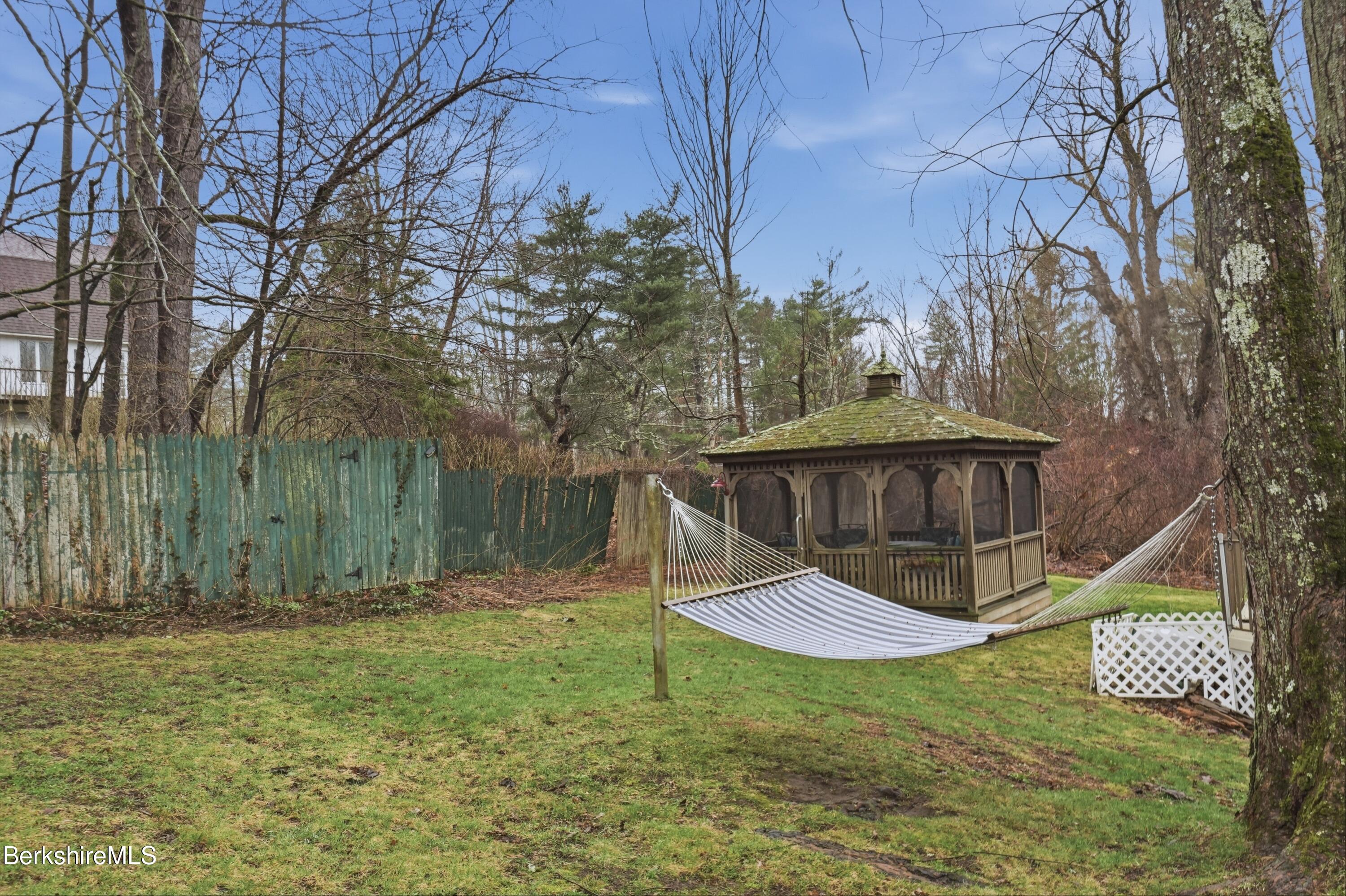 117 Norfolk Road New Marlborough, MA 01259 - Photo 55 of 59 a view of backyard with wooden fence and large trees