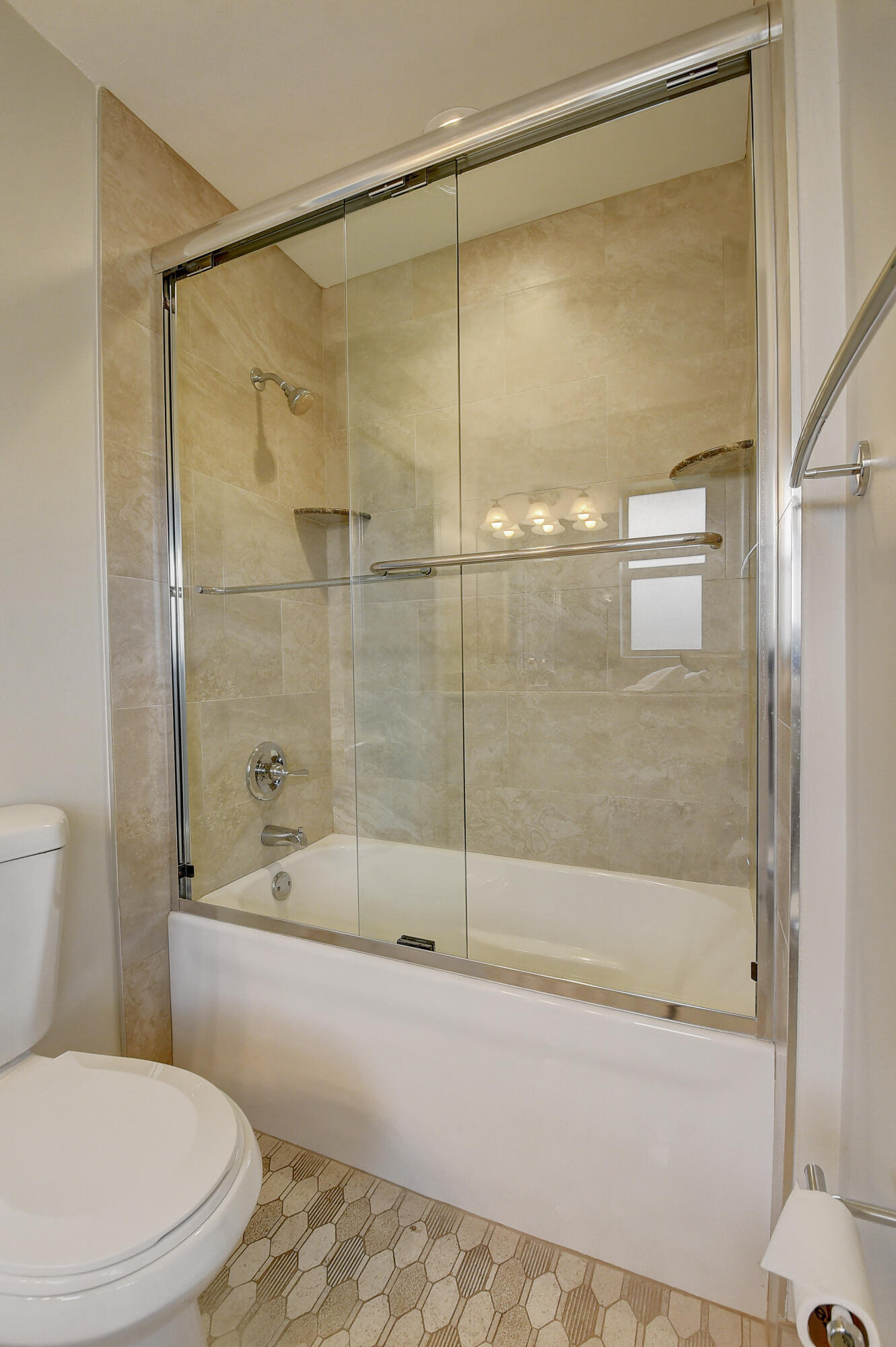 798 Southwest 15th Avenue Boca Raton, FL 33486 - Photo 21 of 27 a bathroom with a shower and a toilet