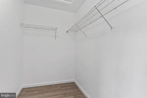 a view of a room with racks on the wall