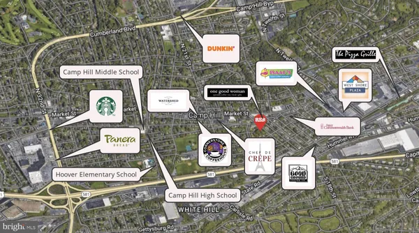 a street sign on a brick wall