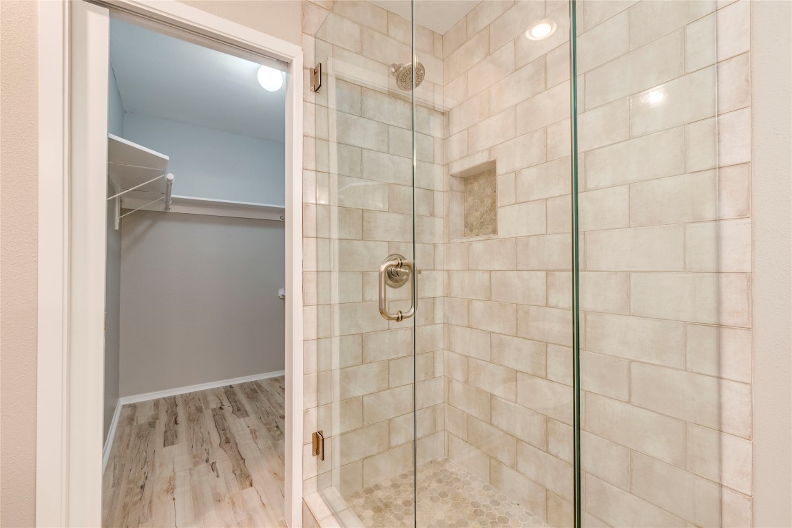 6910 Hart Lane, Unit 805 Austin, TX 78731 - Photo 14 of 17 a bathroom with a shower