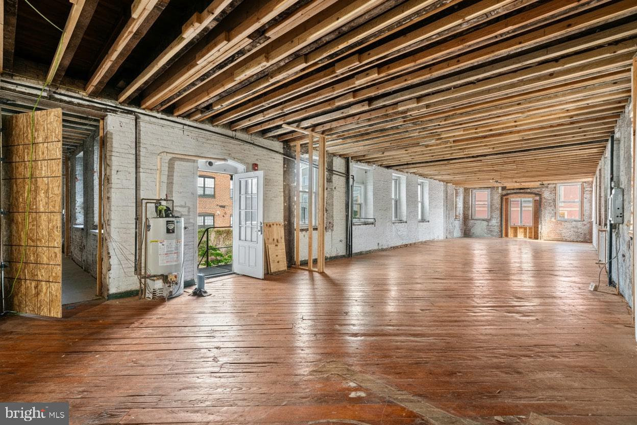 153 West Jefferson Street Philadelphia, PA 19122 - Photo 9 of 31 a view of an empty room with wooden floor