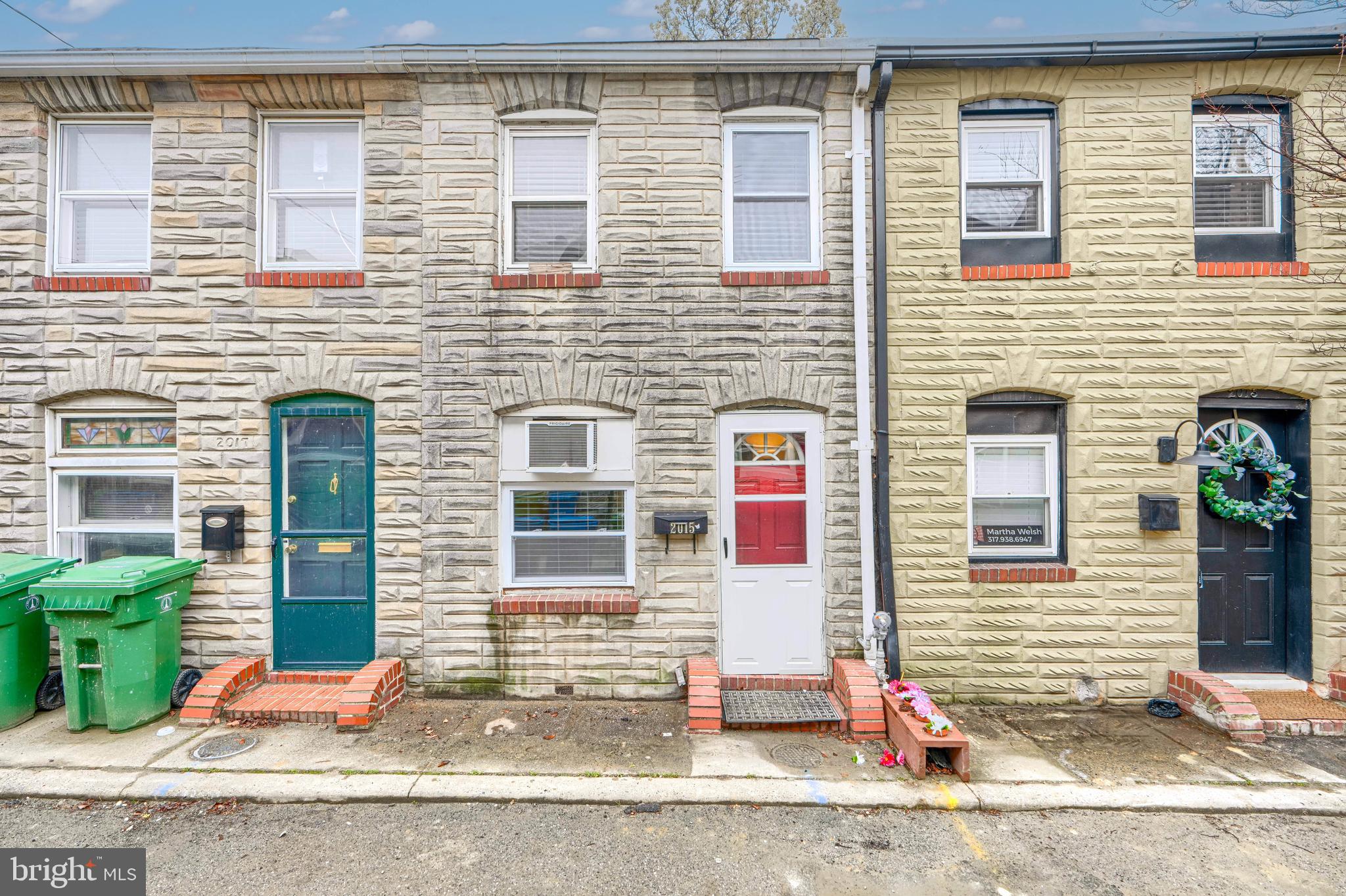 a front view of a house with garage