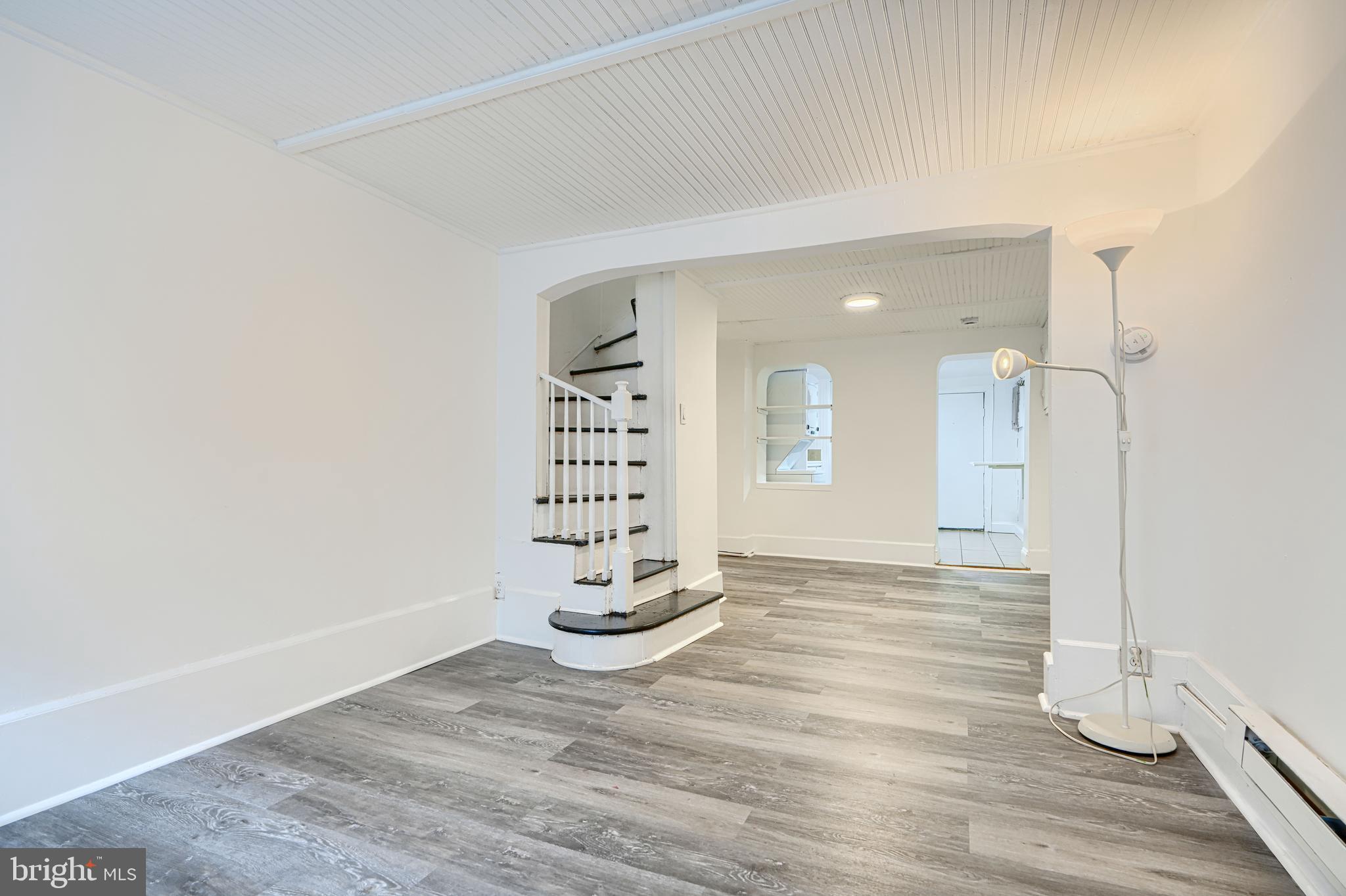 2015 Spark Court Baltimore, MD 21231 - Photo 5 of 12 a view of an empty room and wooden floor