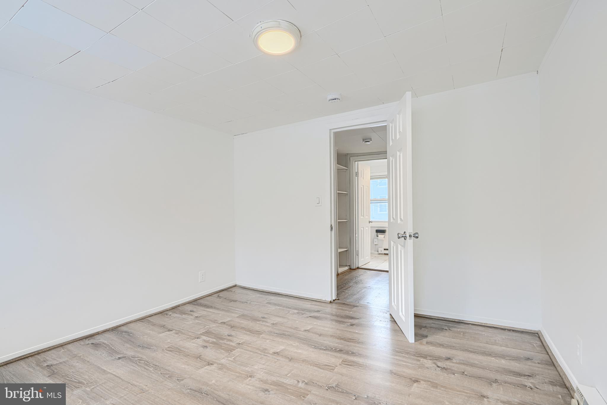 2015 Spark Court Baltimore, MD 21231 - Photo 9 of 12 a view of an empty room and wooden floor
