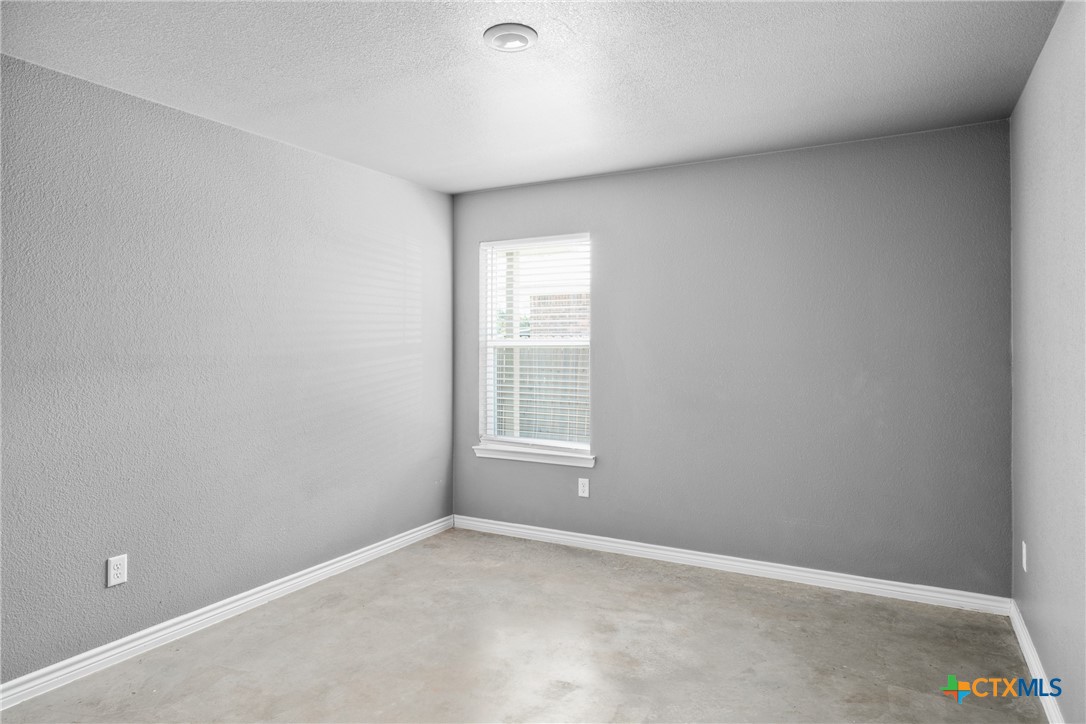 1409 Natchez Trail, Unit A Harker Heights, TX 76548 - Photo 12 of 25 an empty room with a window