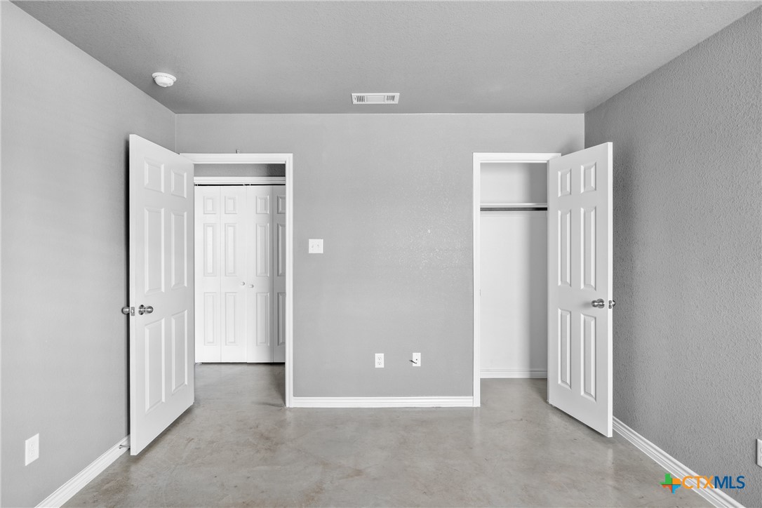 1409 Natchez Trail, Unit A Harker Heights, TX 76548 - Photo 13 of 25 an empty room with windows