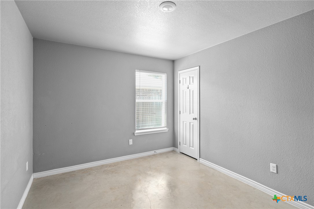 1409 Natchez Trail, Unit A Harker Heights, TX 76548 - Photo 14 of 25 an empty room with windows