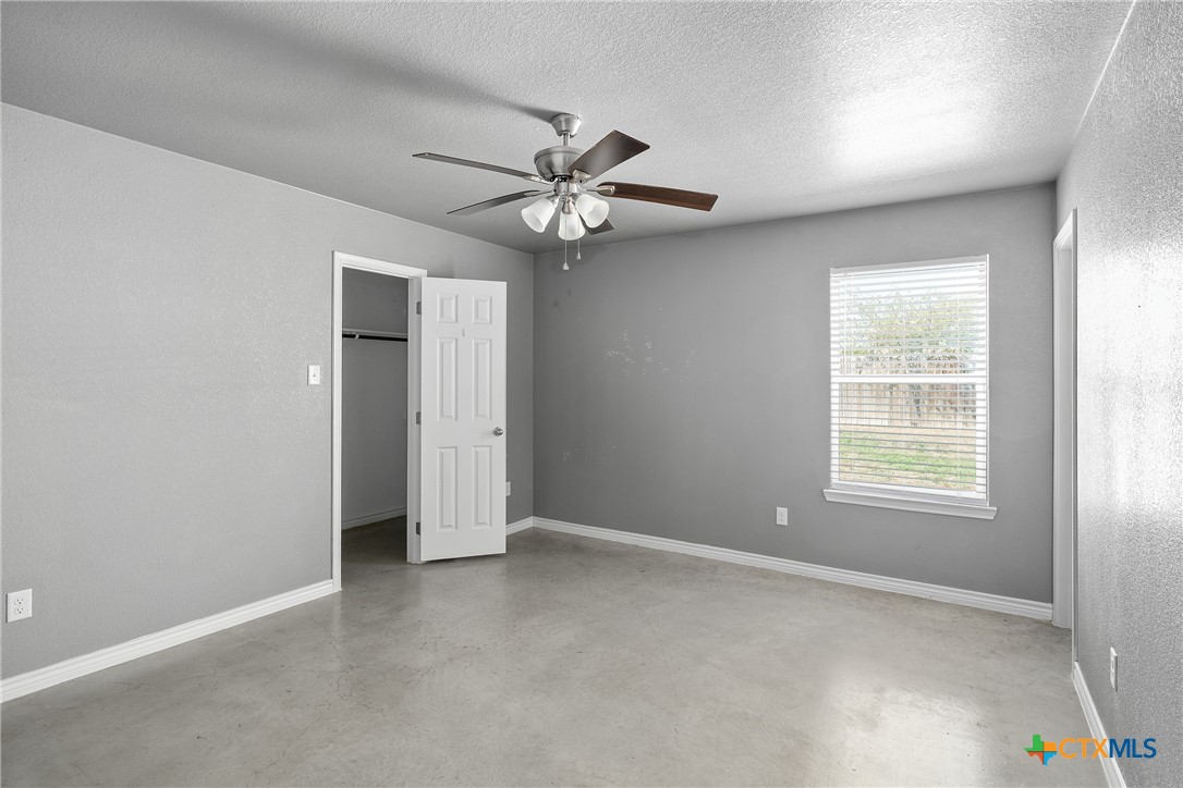1409 Natchez Trail, Unit A Harker Heights, TX 76548 - Photo 16 of 25 an empty room with windows and fan