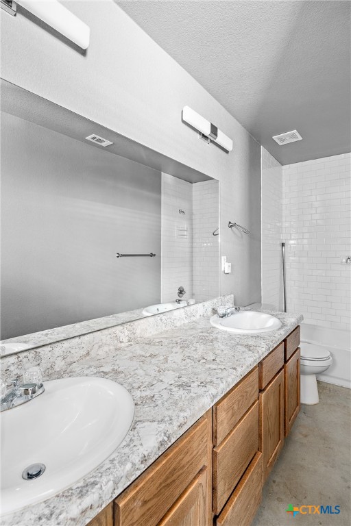 1409 Natchez Trail, Unit A Harker Heights, TX 76548 - Photo 19 of 25 a bathroom with a granite countertop sink and a mirror