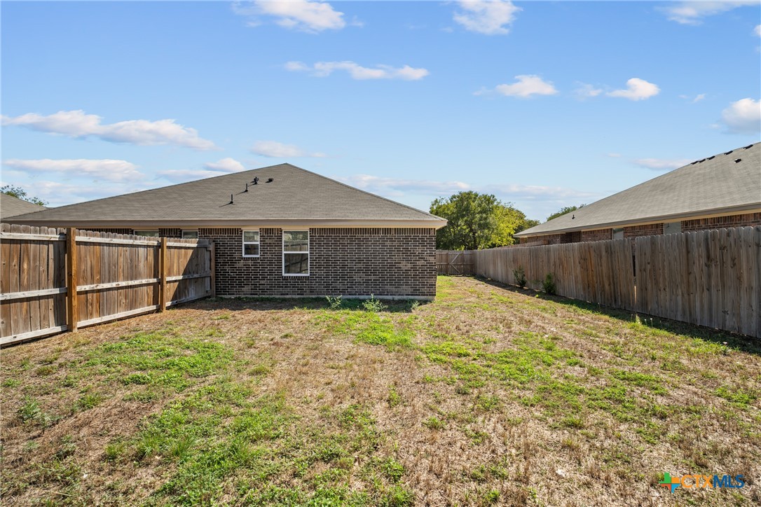 1409 Natchez Trail, Unit A Harker Heights, TX 76548 - Photo 22 of 25 a front view of a house with a yard